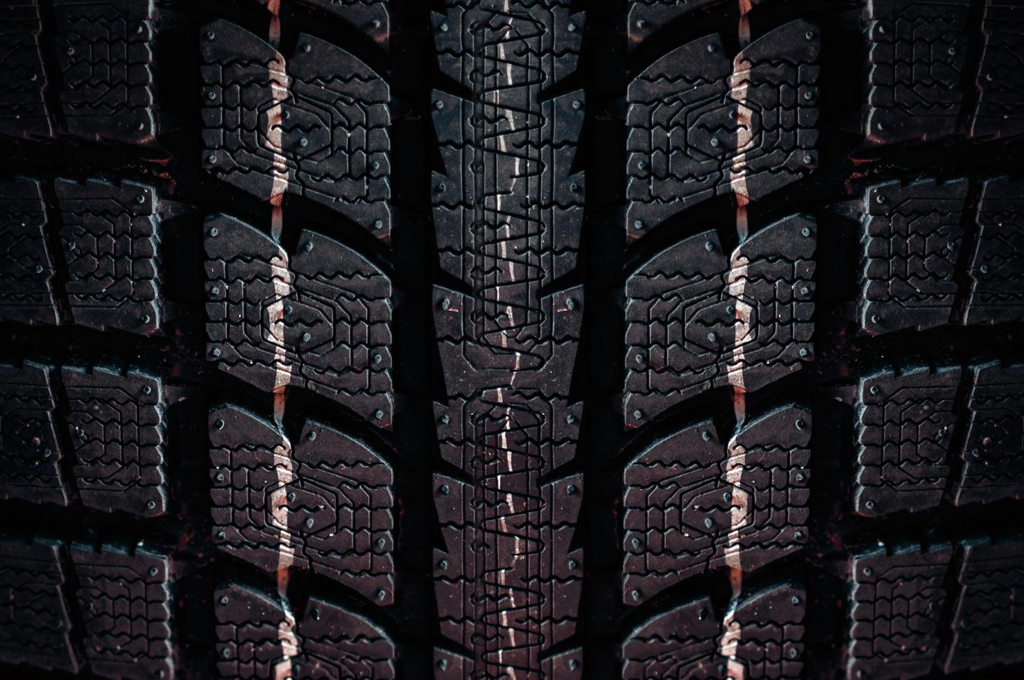 Close up on a tire on a dark background photo