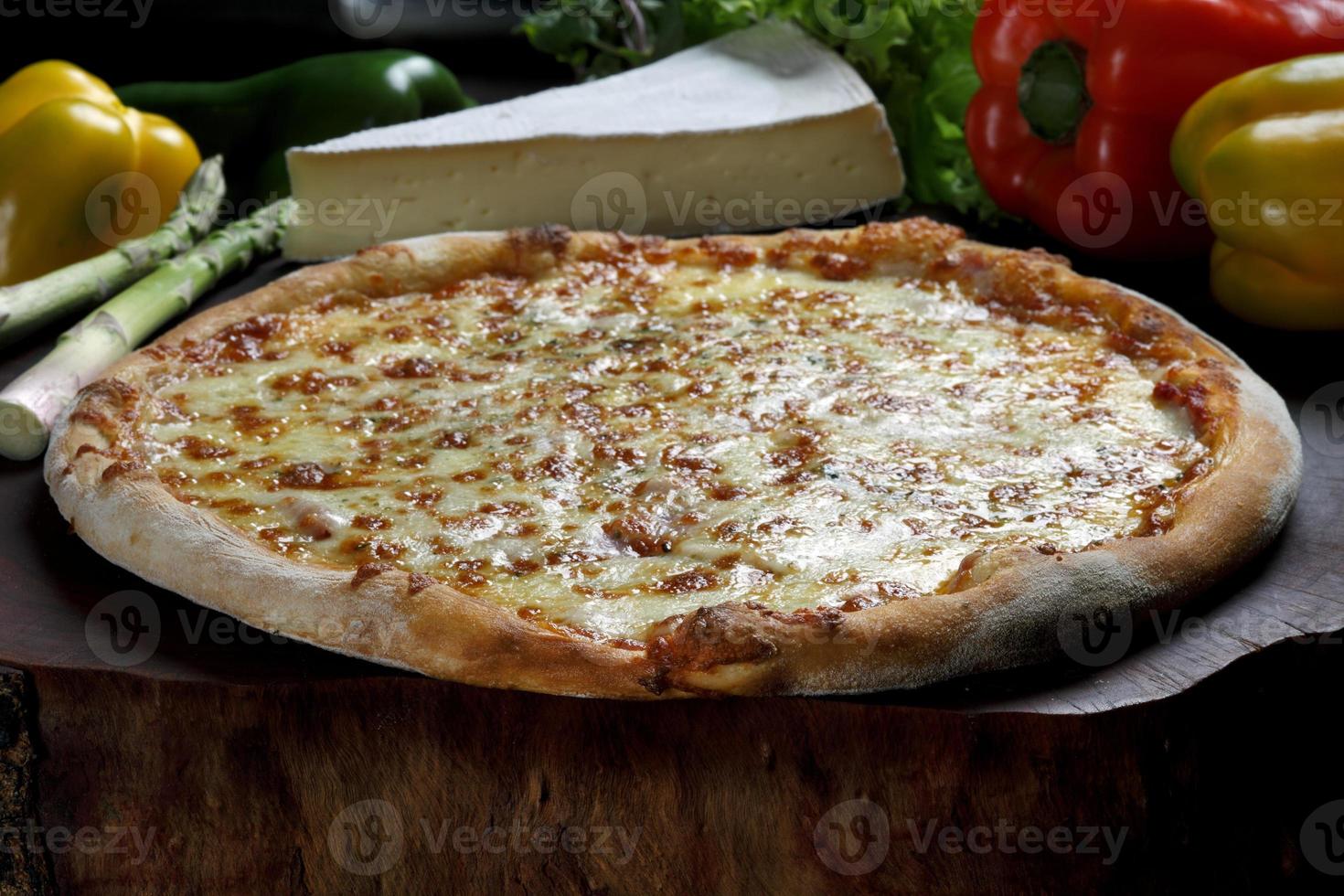 Pizza and vegetables photo