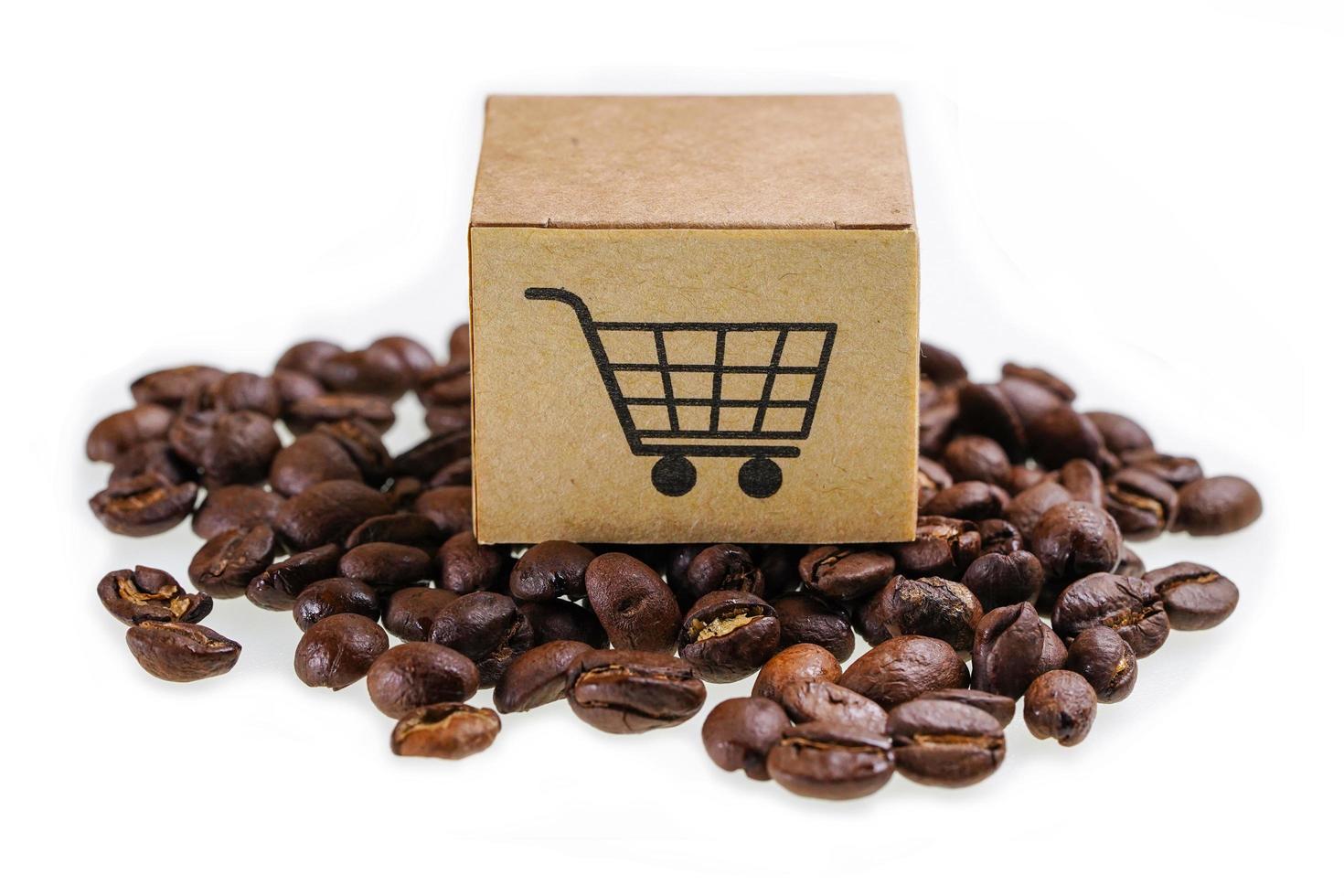 Shopping cart on coffee bean, import export online photo