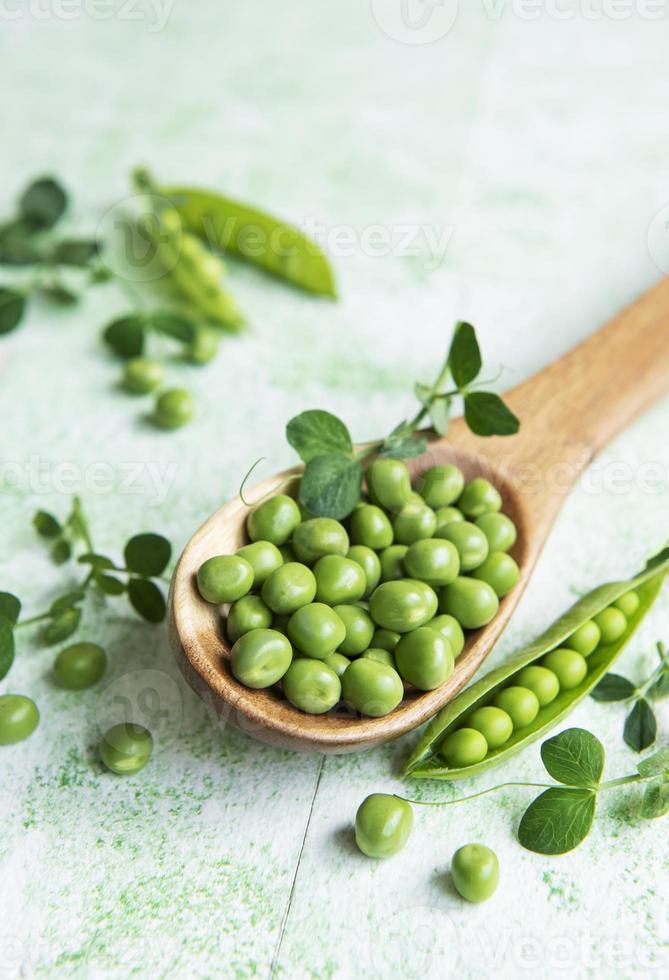 Fresh green peas pods and green peas with sprouts photo