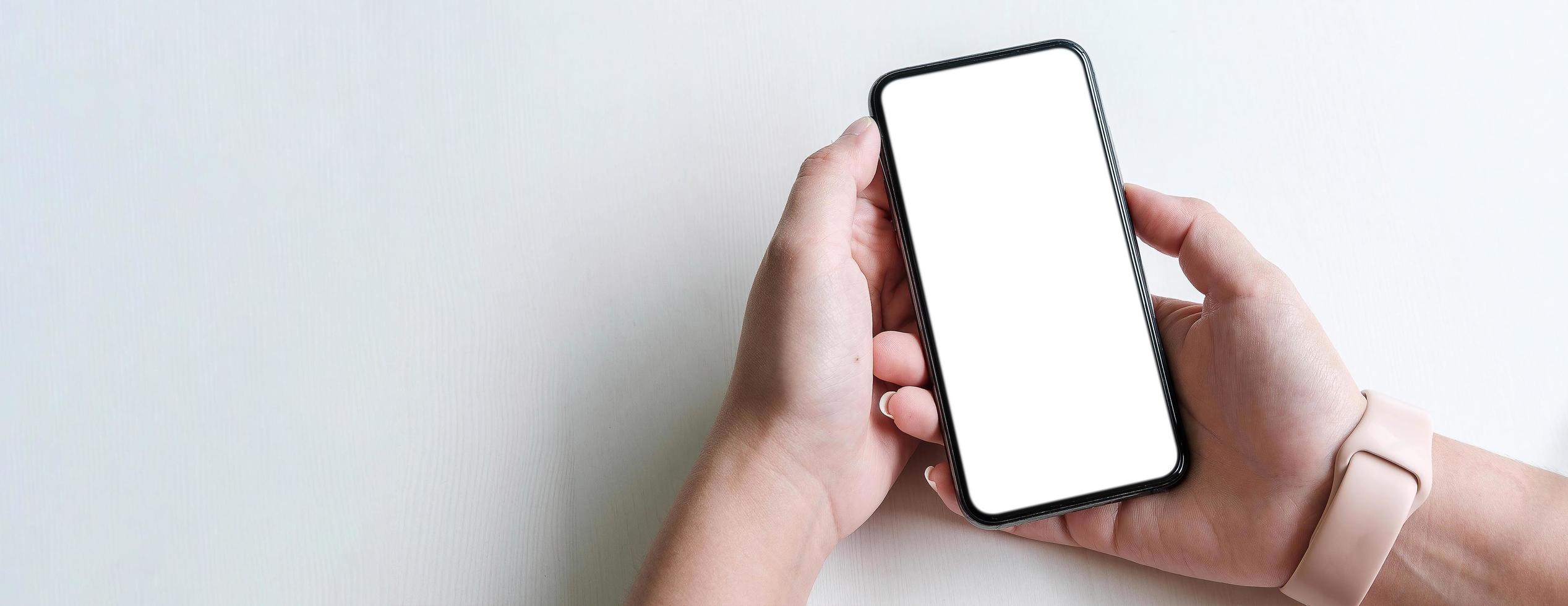 teléfono móvil con pantalla en blanco para gráficos foto