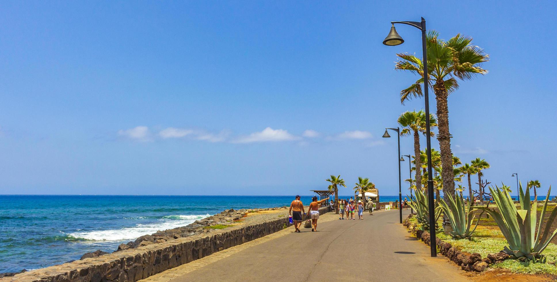 People at the Atlantic Ocean at Tenerife, on the Canary islands photo