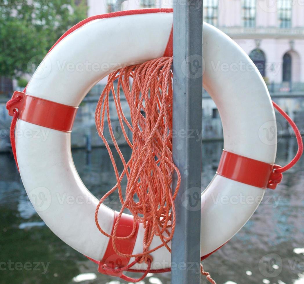 Lifebuoy by the river photo