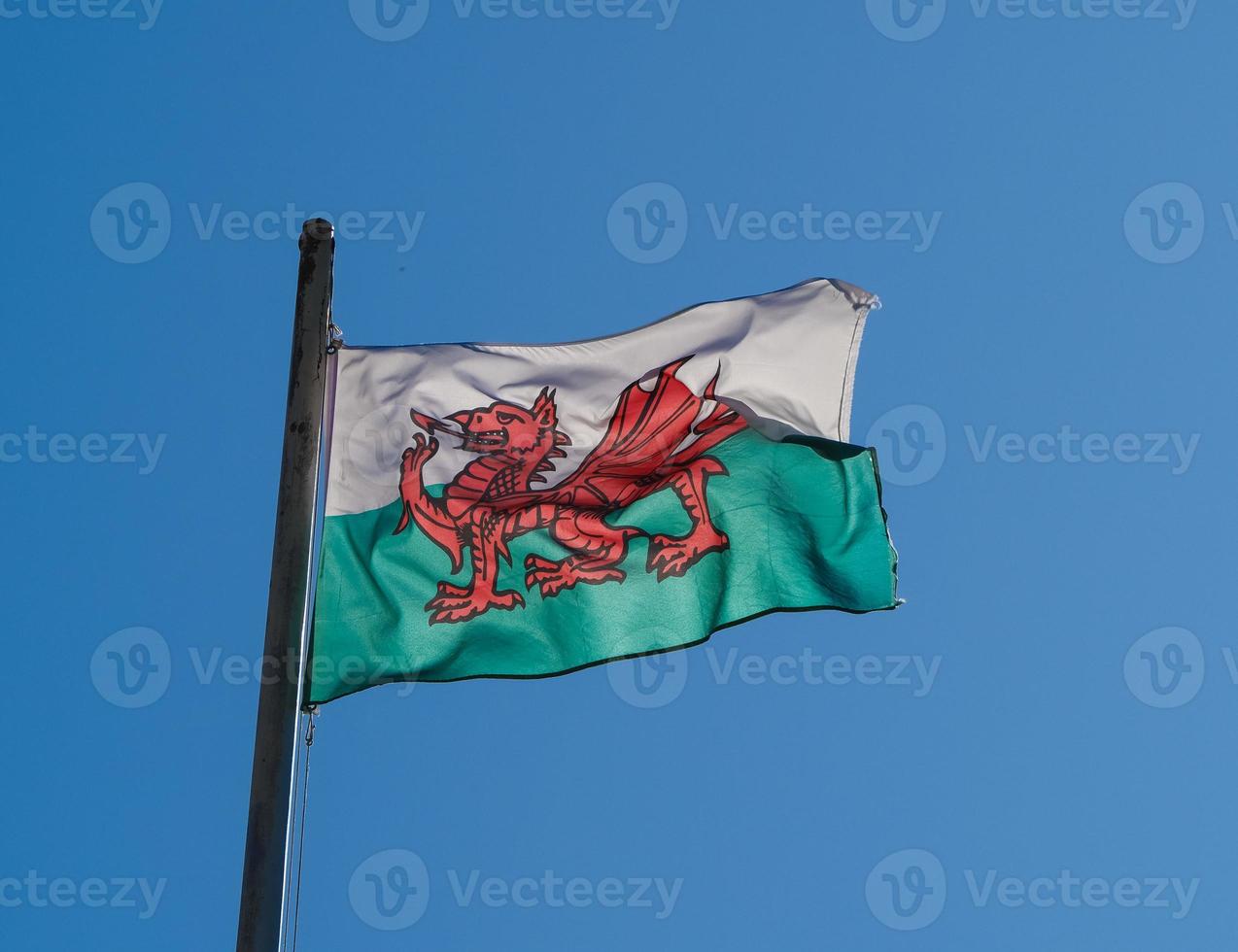 Welsh Flag of Wales over blue sky photo