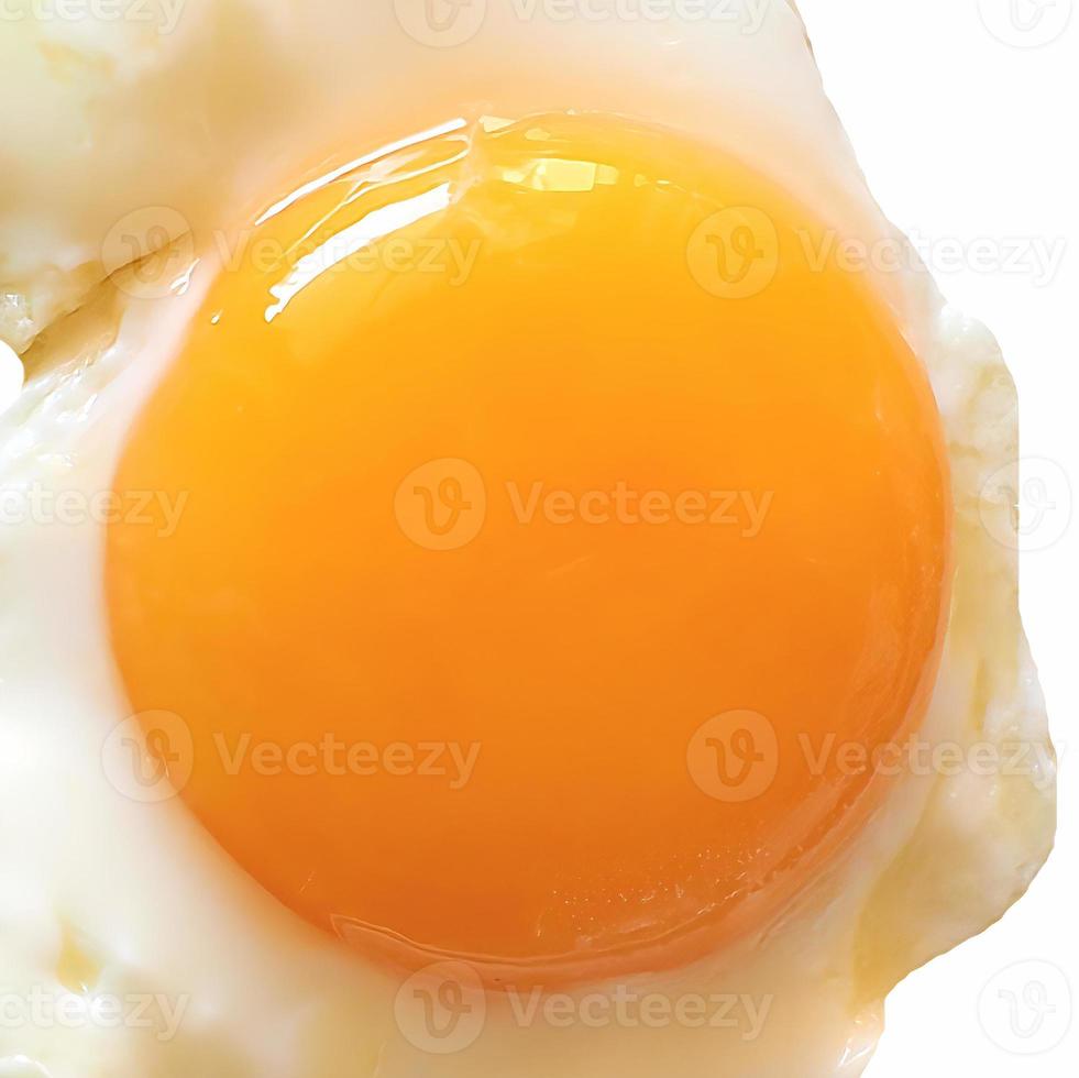 Fried egg isolated over white with copy space photo