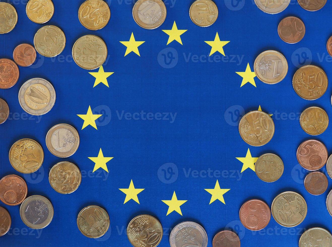 Euro coins, European Union, over flag photo