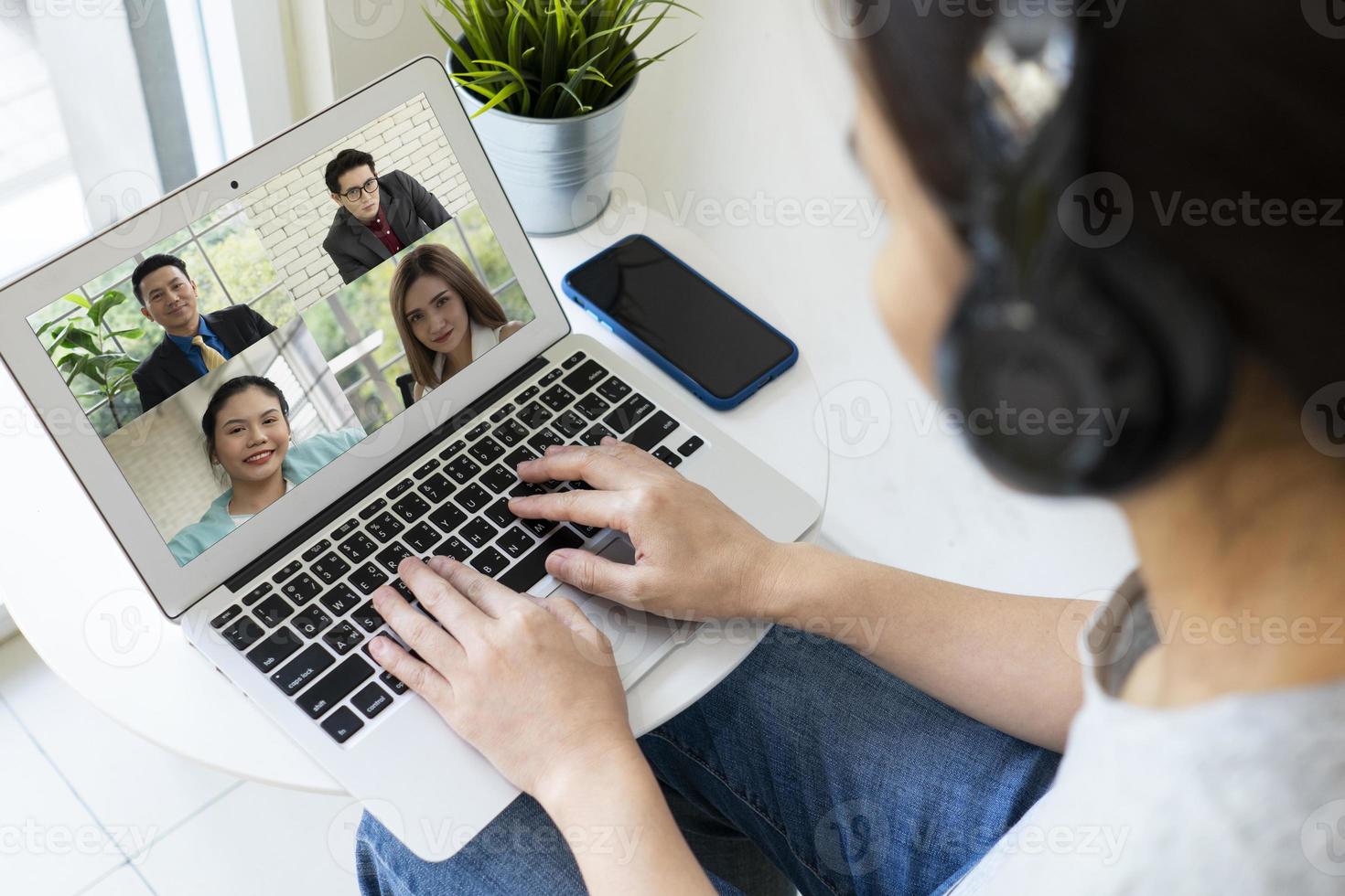 businesswoman video call with client from home photo