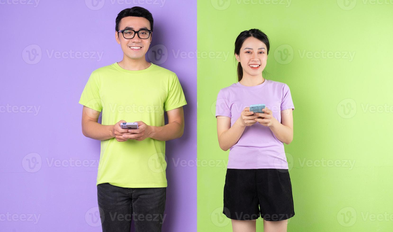 Young Asian couple using smartphone, long distance love concept photo