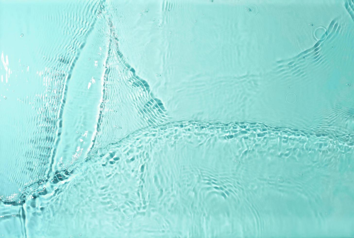 texture of splashing water on pastel background photo