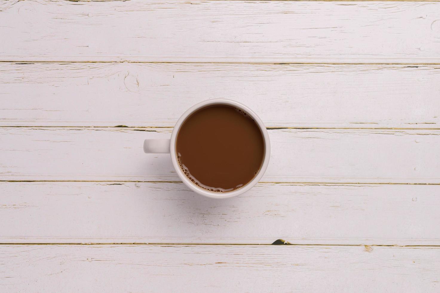 coffee mug on wooden background photo