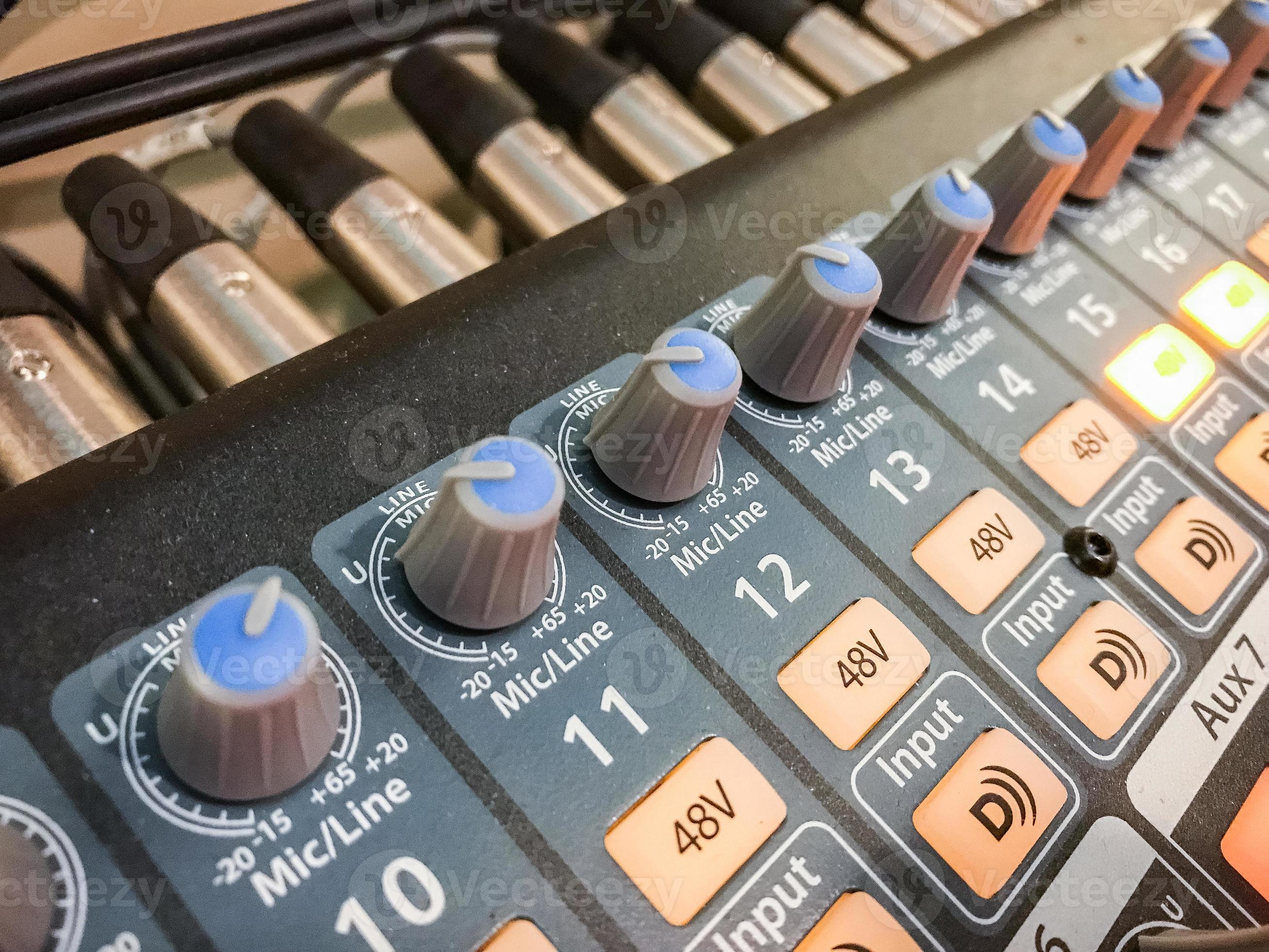 Gain knobs on soundboard 3130985 Stock Photo at Vecteezy