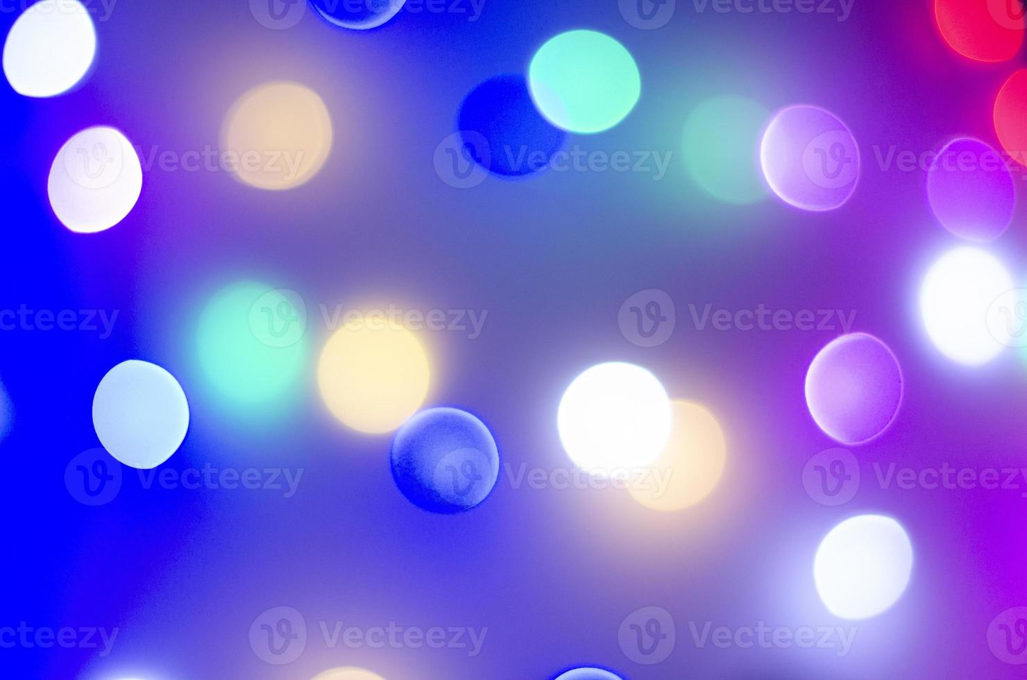 Multi-colored bokeh in neon colors photo