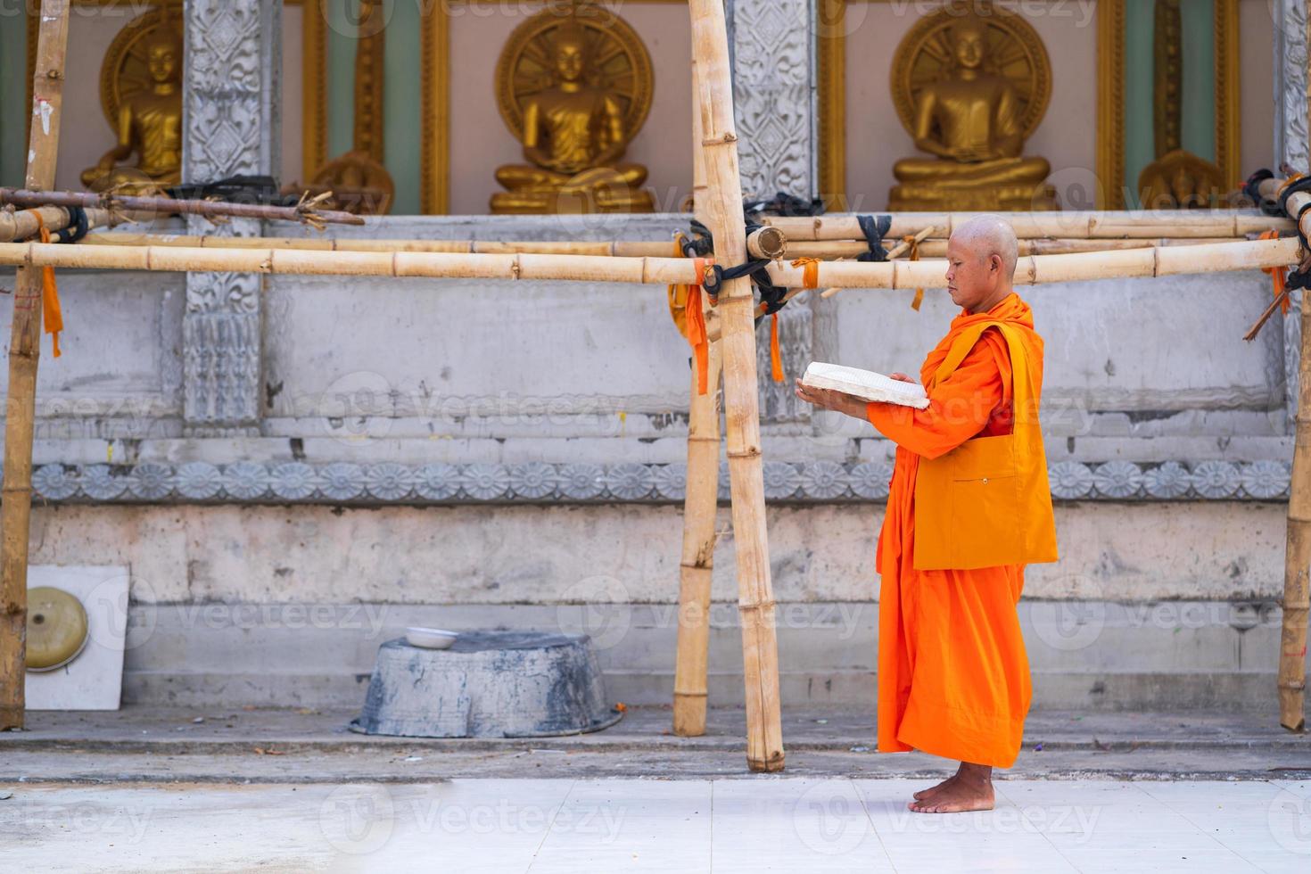 Monks in Thailand are reading books photo