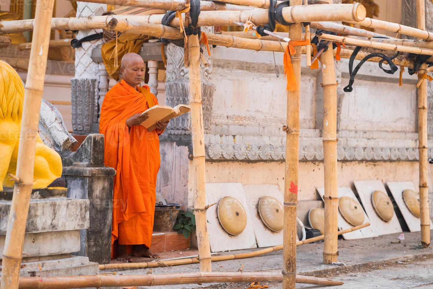 Monks in Thailand are reading books photo