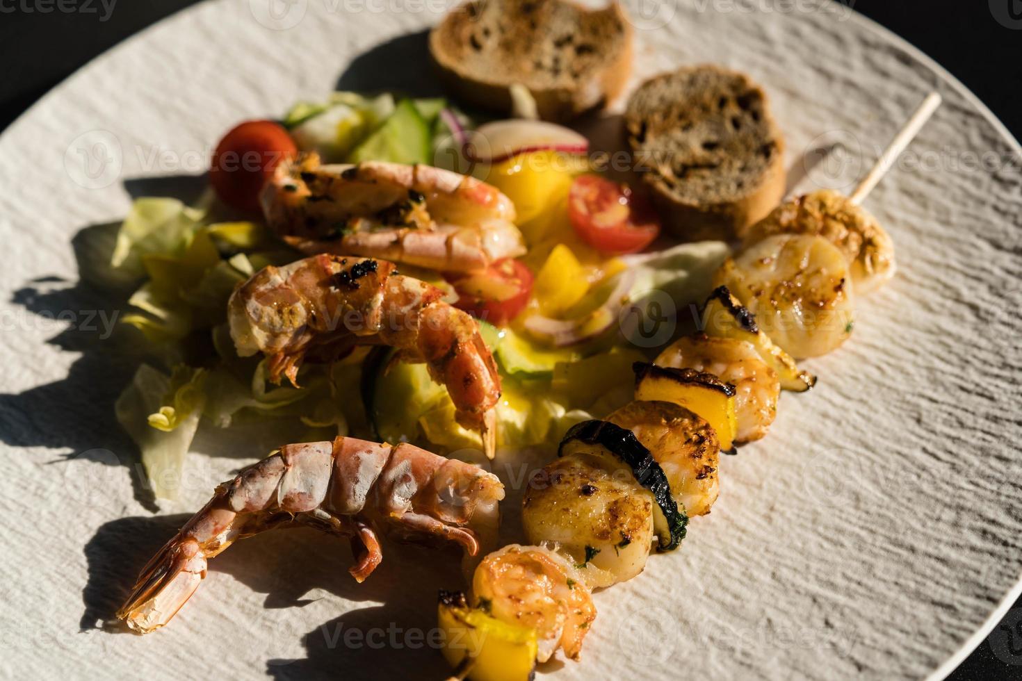 Mediterranean marinated seafood for grilling photo