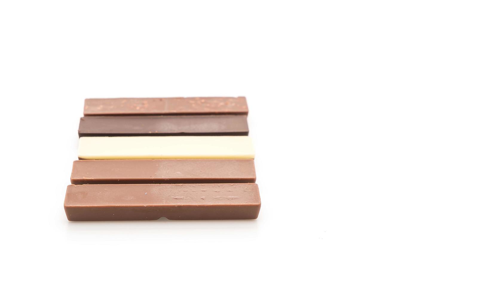 Chocolate bars on white background photo