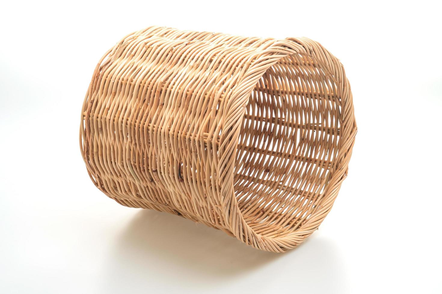 Wicker basket isolated on white background photo