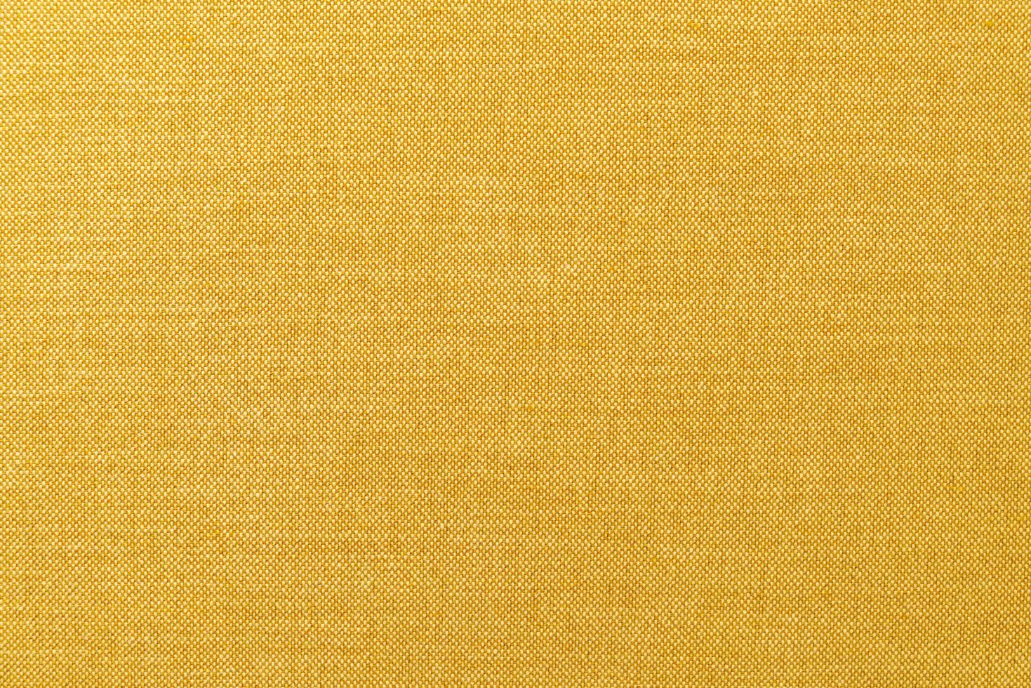 Close-up yellow or golden mustard fabric surface texture for background photo