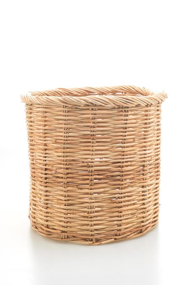 Wicker basket isolated on white background photo