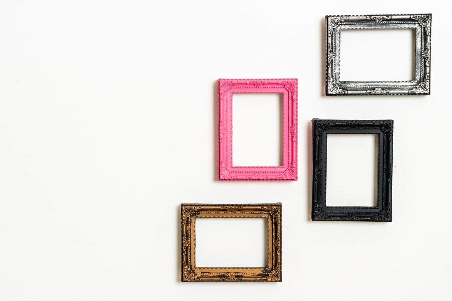 Empty picture frame on white wall background with copy space photo