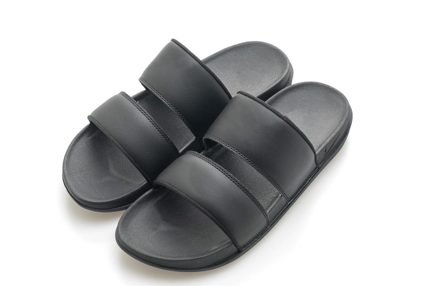 Black leather sandals isolated on white background photo