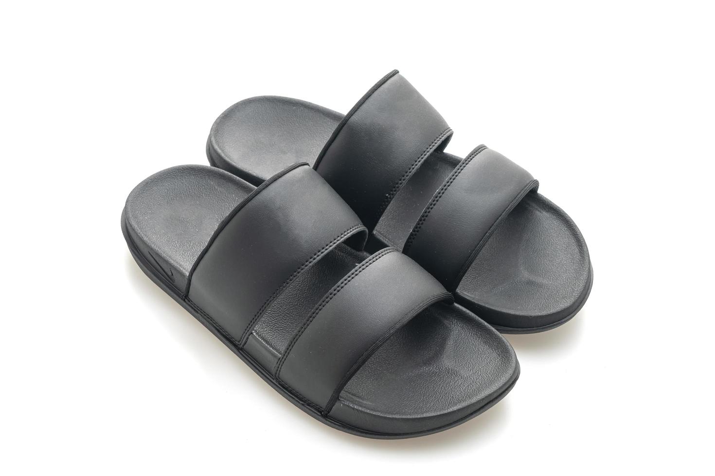 Black leather sandals isolated on white background photo
