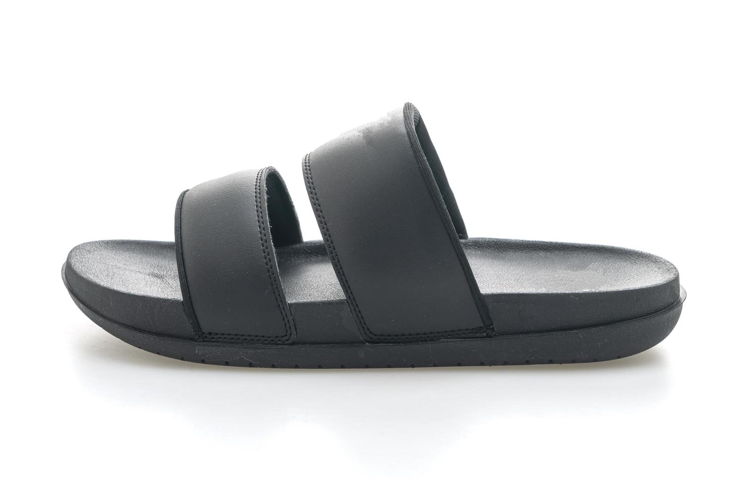 Black leather sandals isolated on white background photo