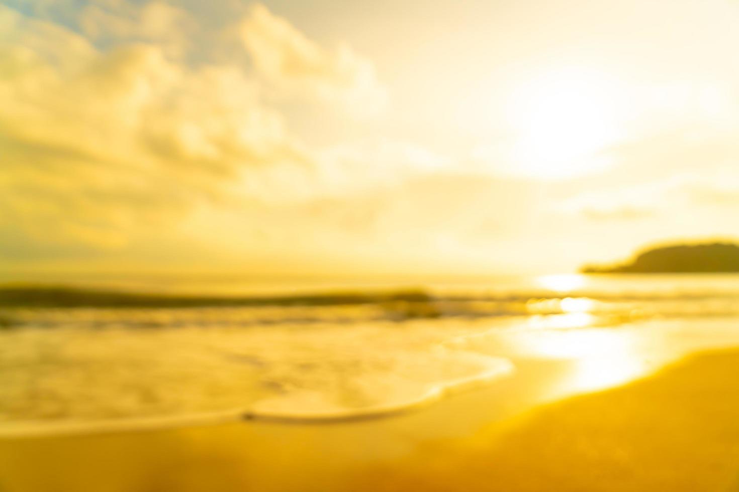 Abstract blur beach sea at sunrise or sunset time for background photo