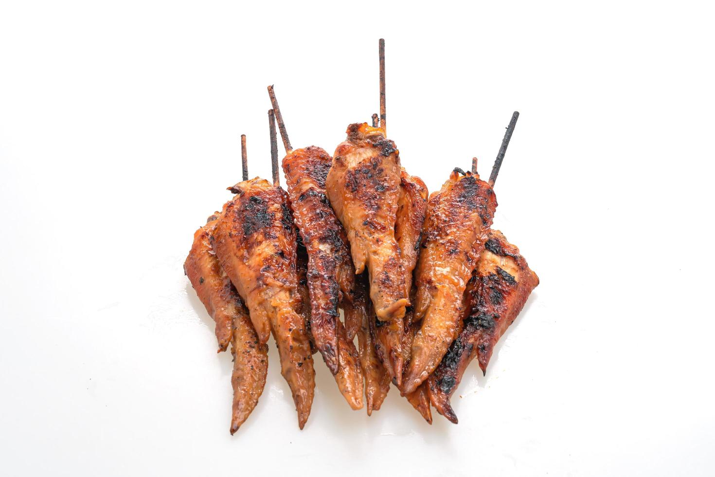 Grilled or barbecue chicken wings skewer with sticky rice photo