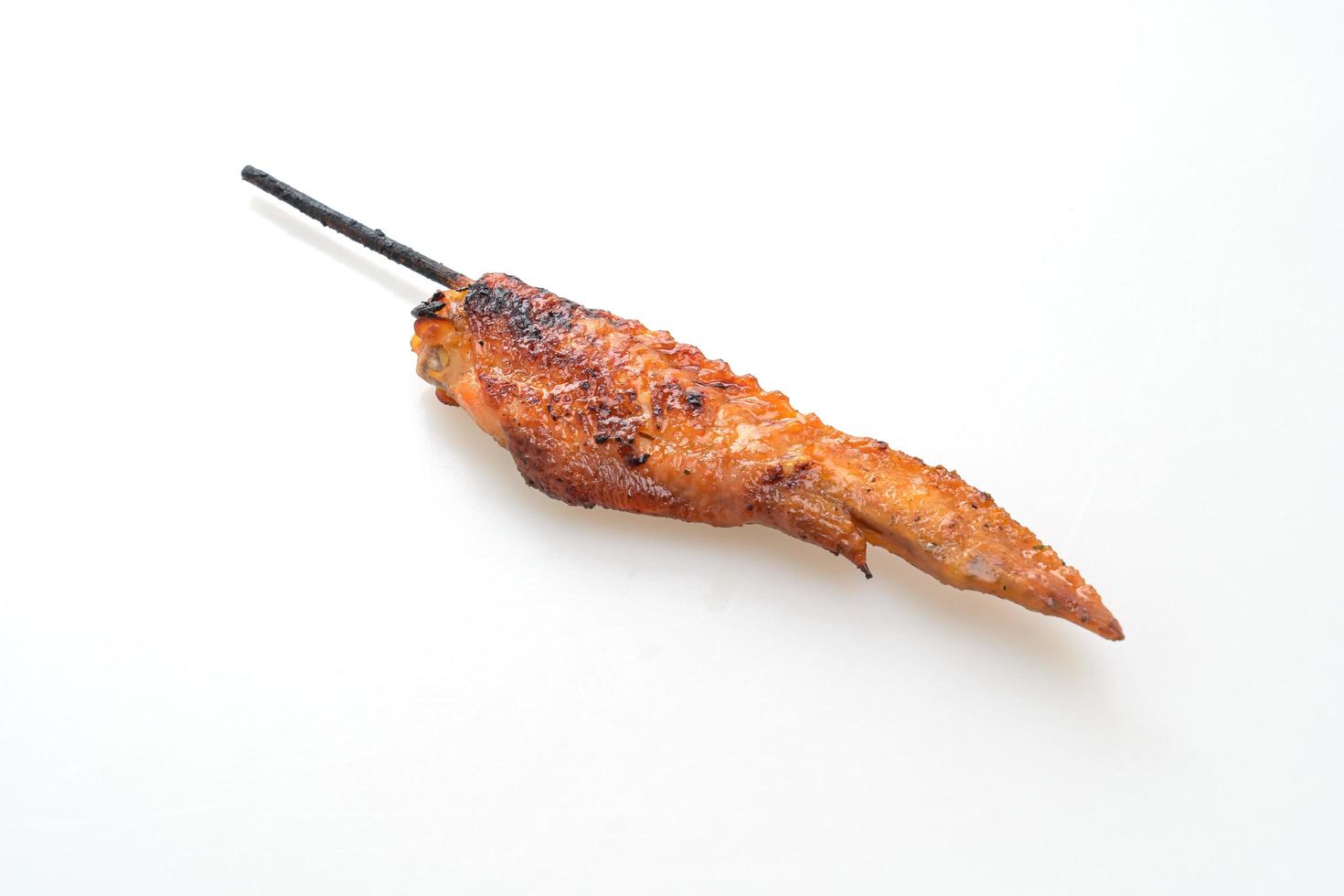 Grilled or barbecue chicken wings skewer with sticky rice photo