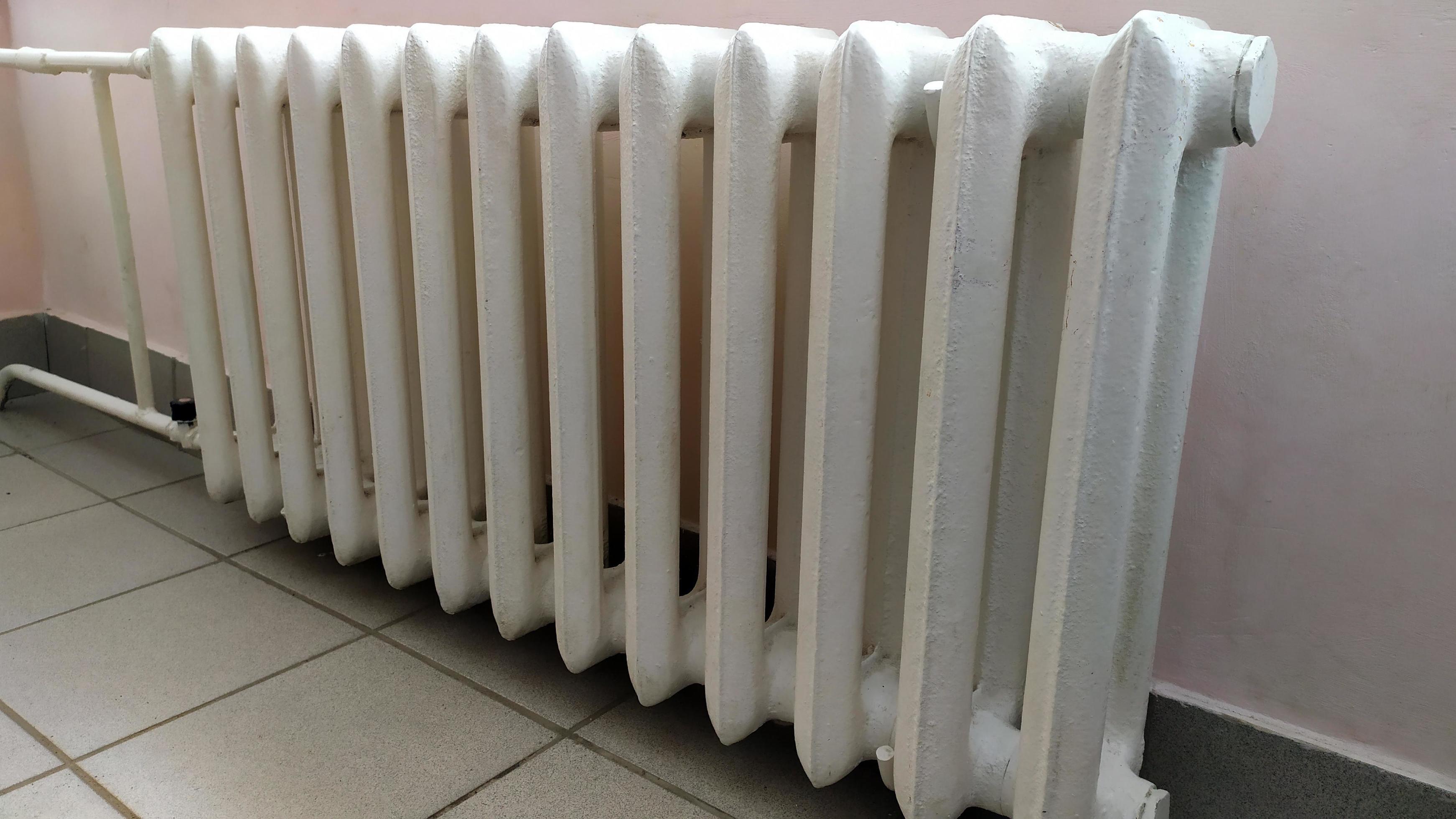 Indoor heating radiator. Cast iron radiators heat the room. 3134220