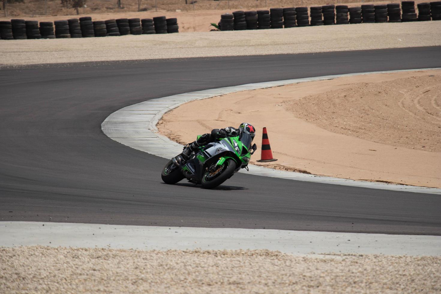 City, Country, MMM DD, YYYY - Motorcycle competition at a race track photo