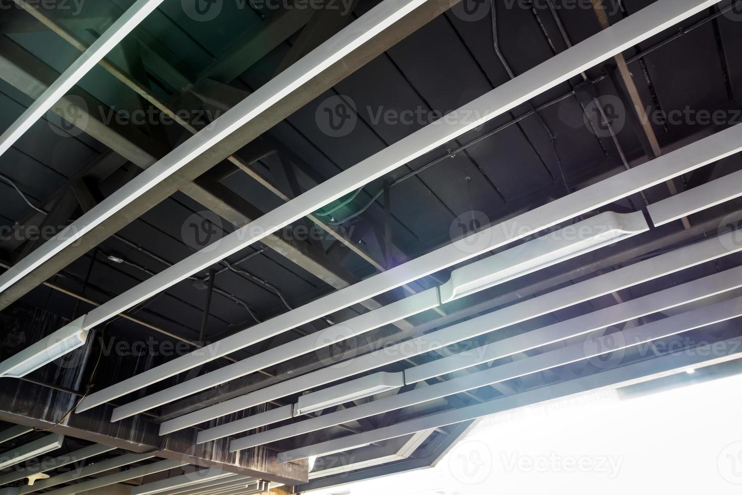 Ceiling mounted ducts of electric power and communication system photo