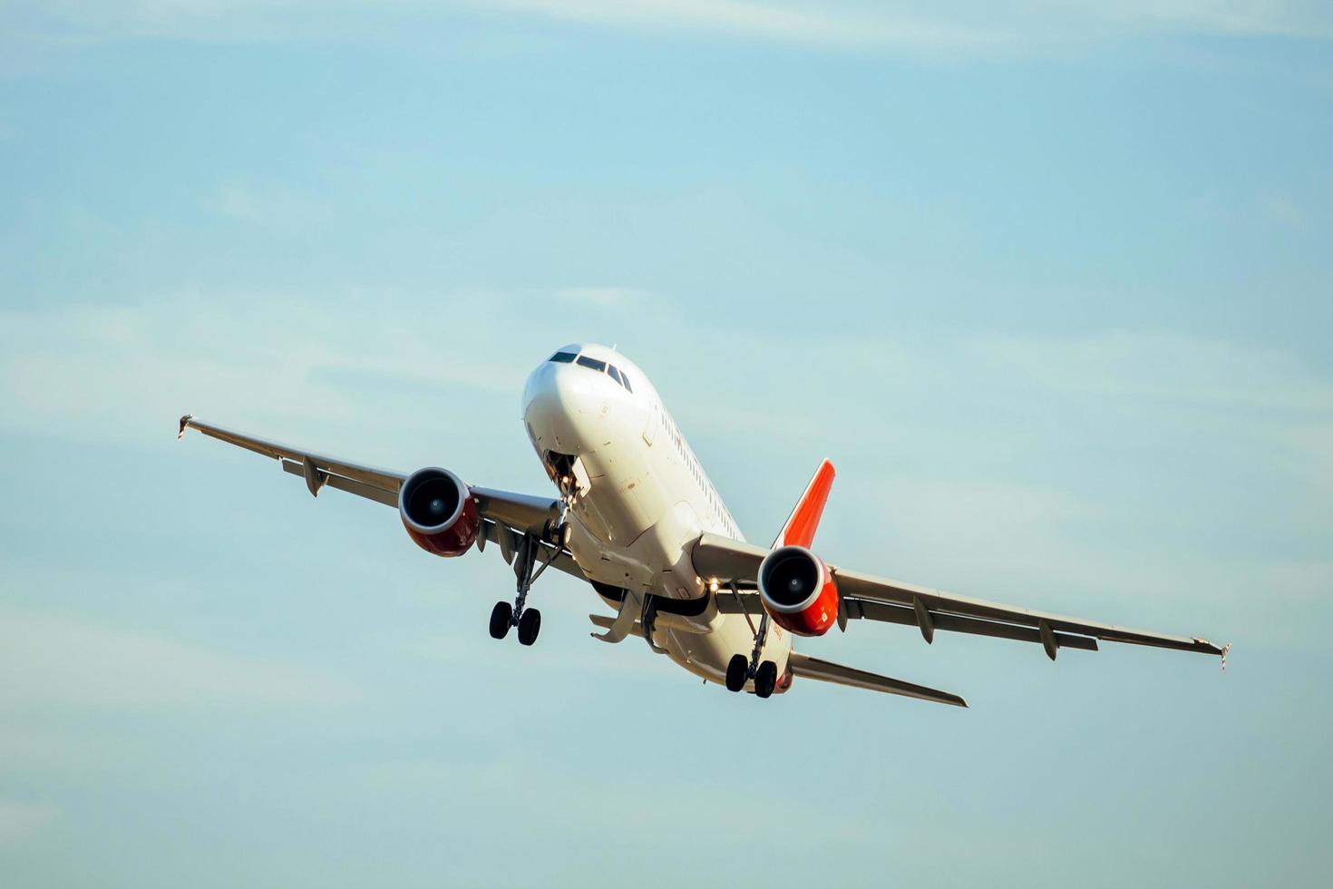 A Commercial air plane taking off photo