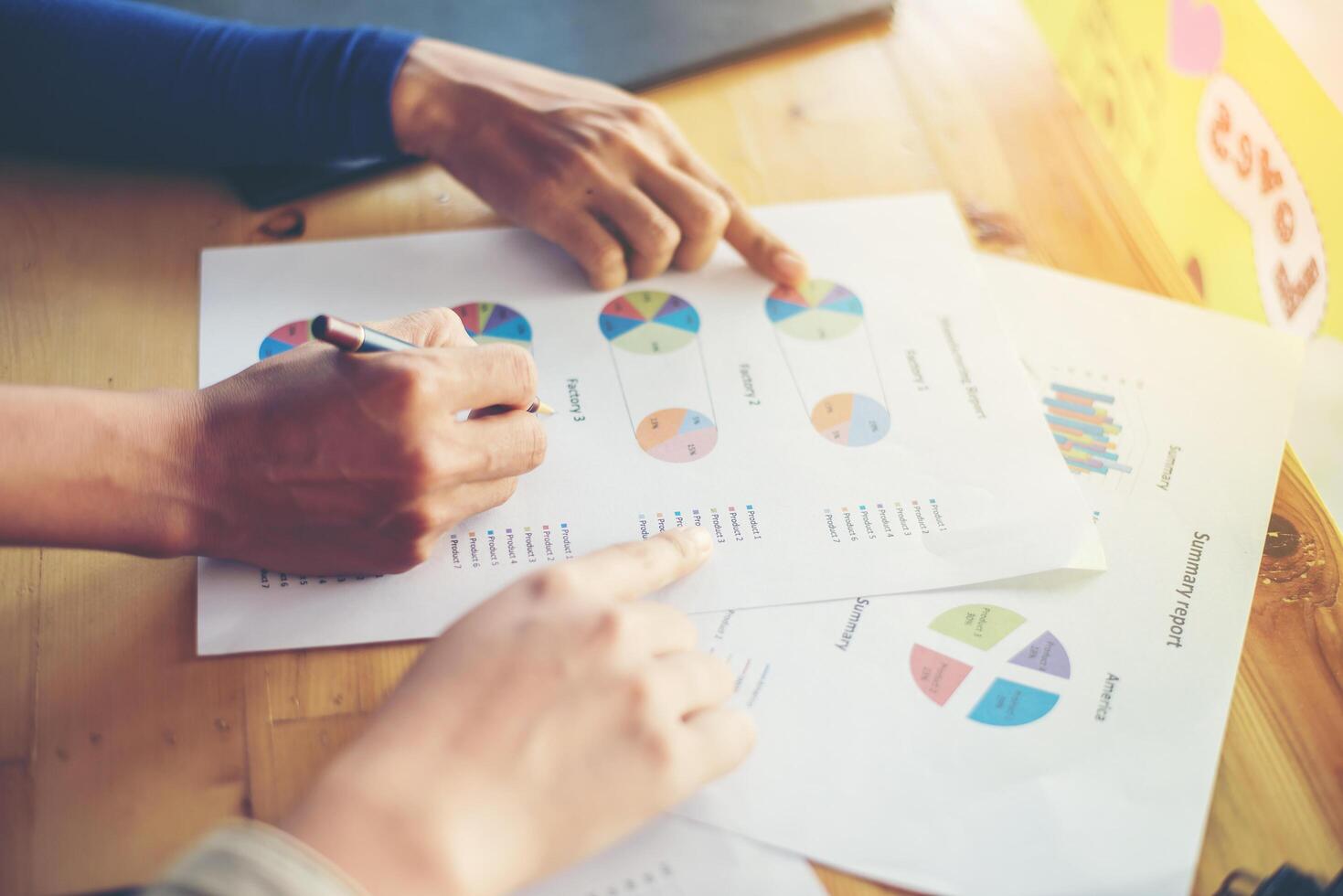 Business woman's hands working and holding business information photo