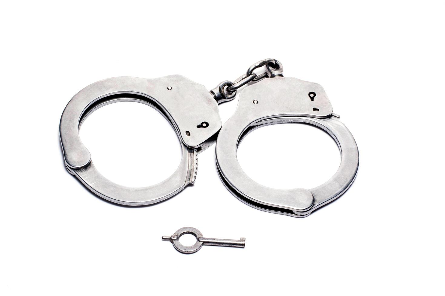 Handcuffs isolated in white background photo