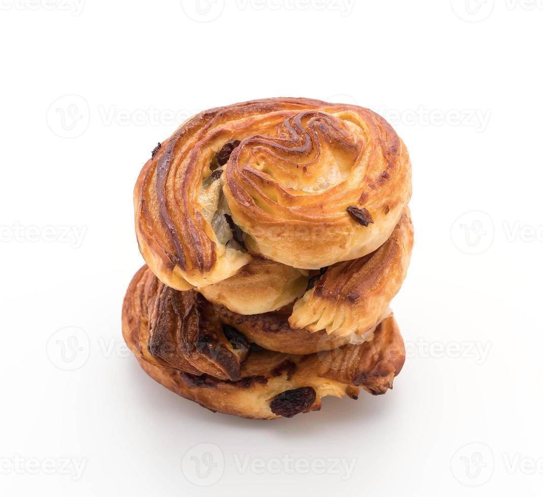 Cinnamon raisin roll on white background photo