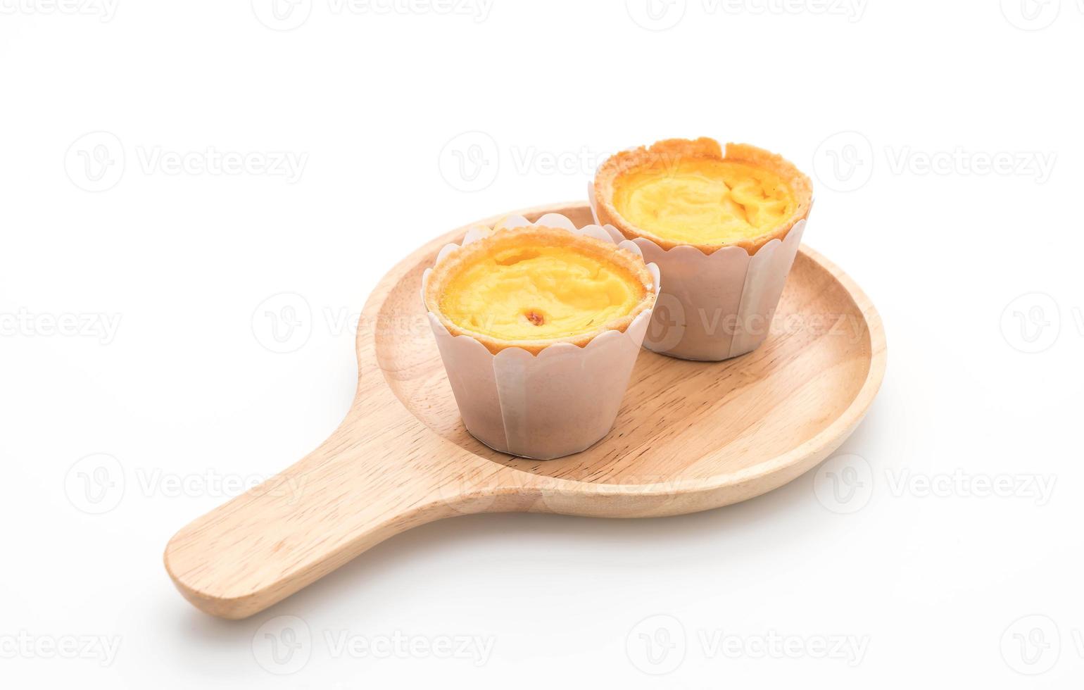 Egg tart on wood plate photo