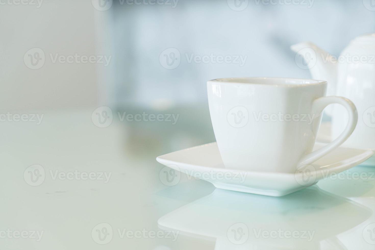 Hot tea cup on the table photo