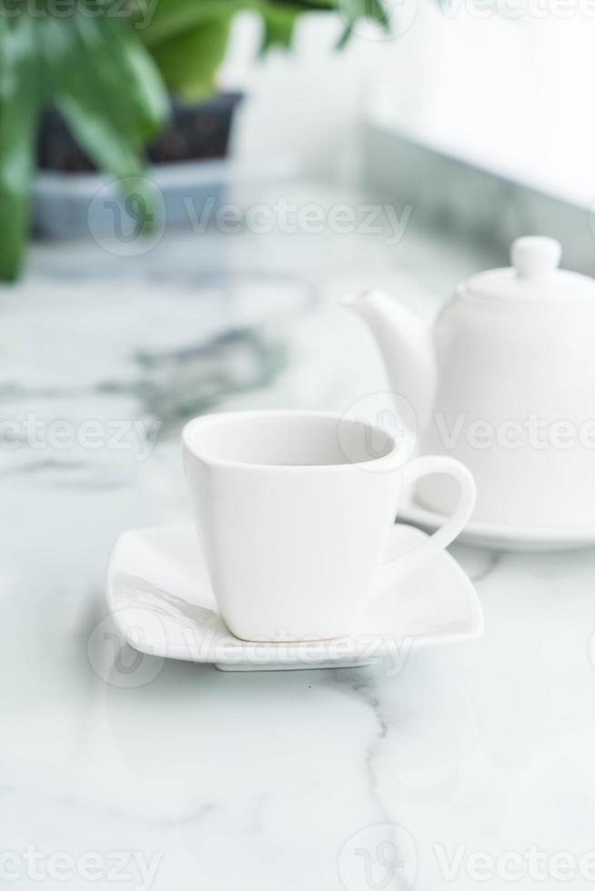 Hot tea cup on the table photo