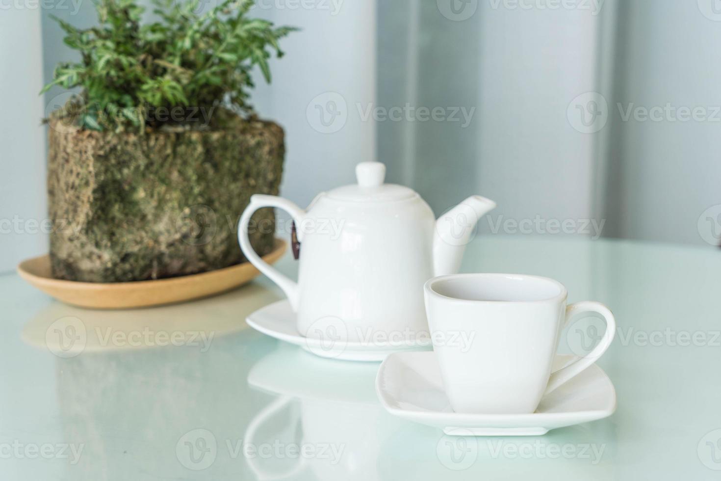 Hot tea cup on the table photo