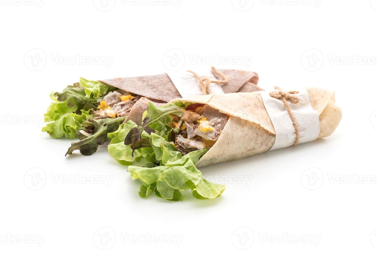 Wrap salad roll with tuna corn salad on white background photo