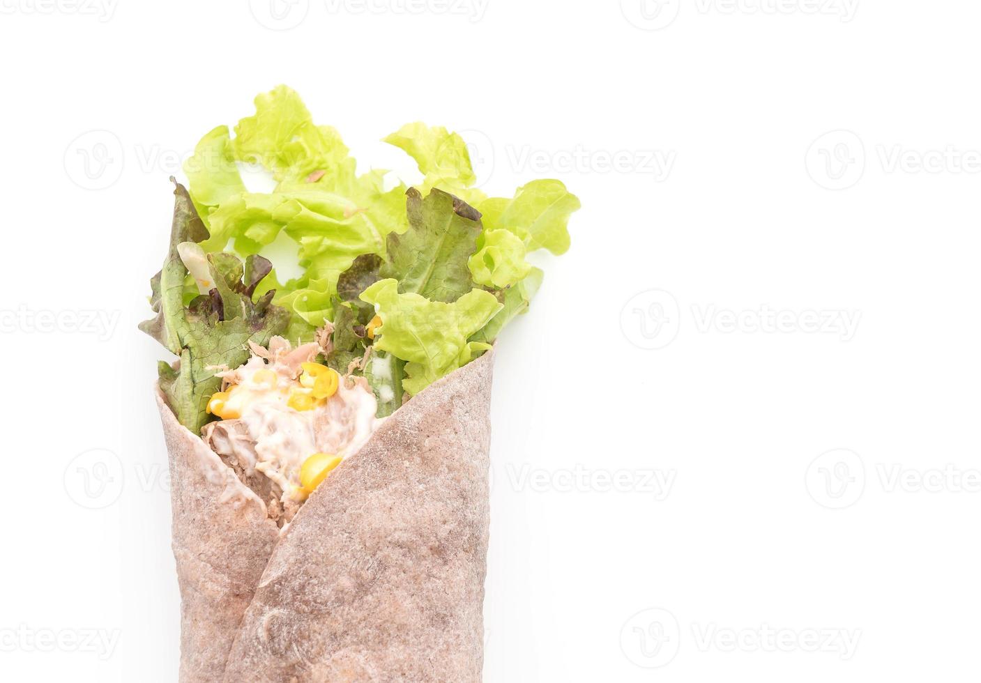 Wrap salad roll with tuna corn salad on white background photo