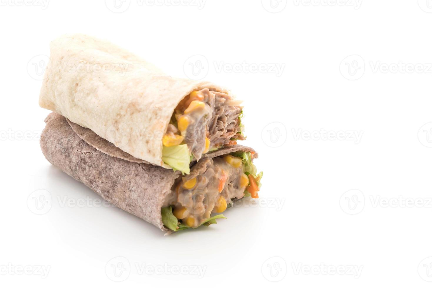 Wrap salad roll with tuna corn salad on white background photo