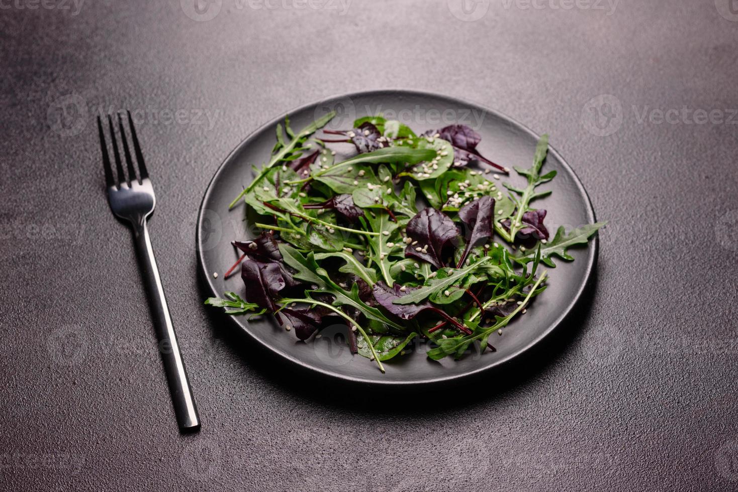 Healthy food, salad mix with arugula, spinach, bulls blood photo