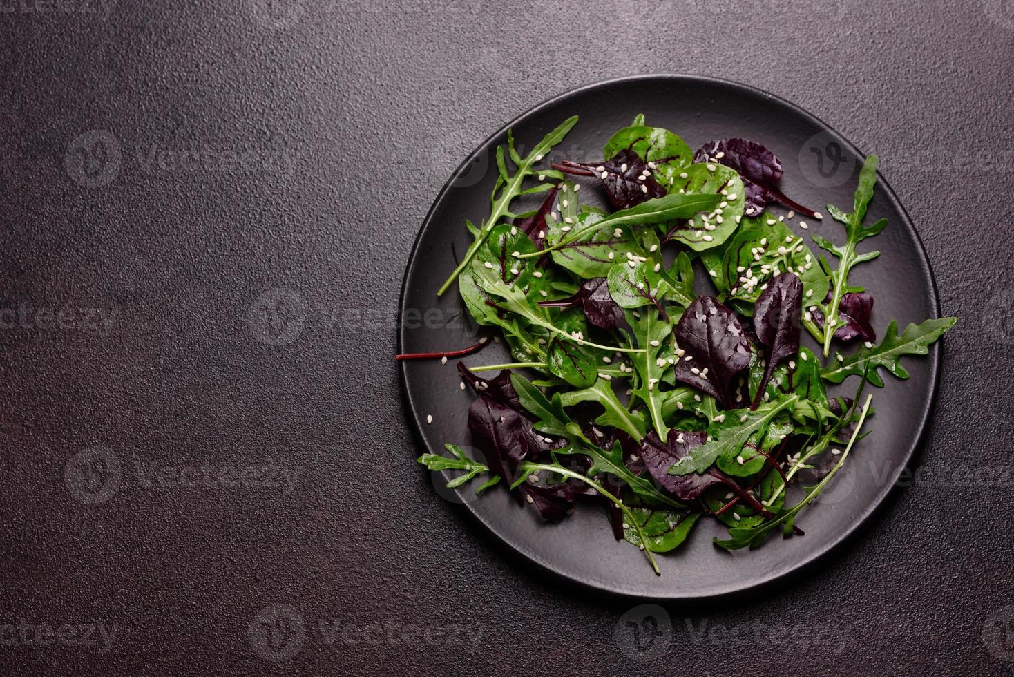 Healthy food, salad mix with arugula, spinach, bulls blood photo