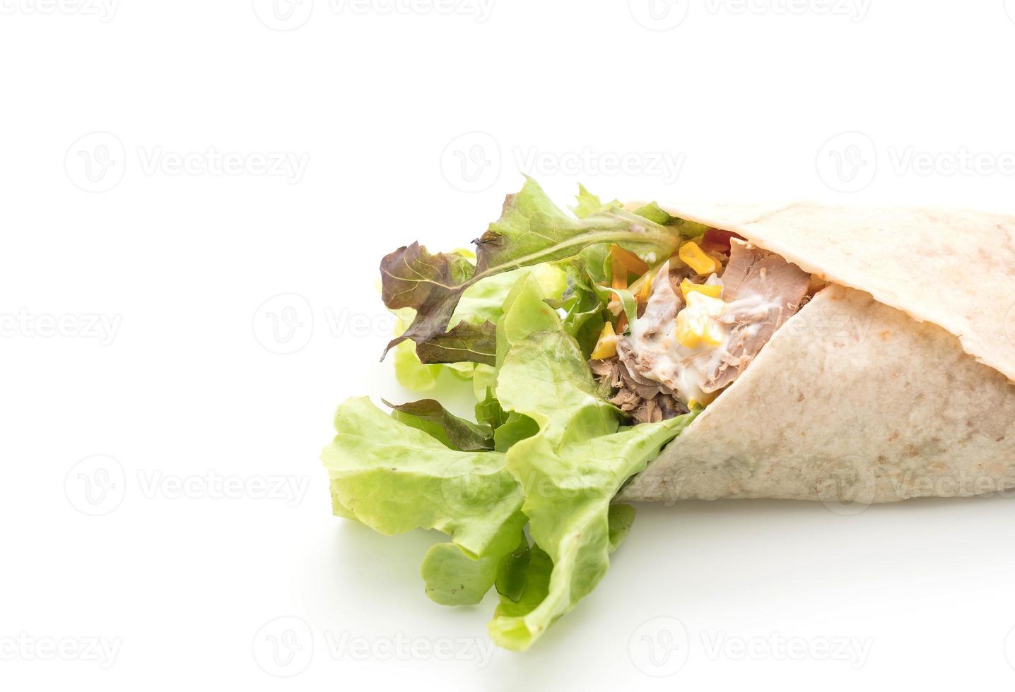 Wrap salad roll with tuna corn salad on white background photo