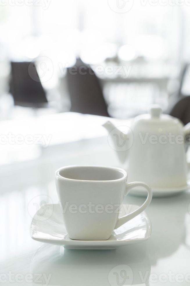 Hot tea cup on the table photo