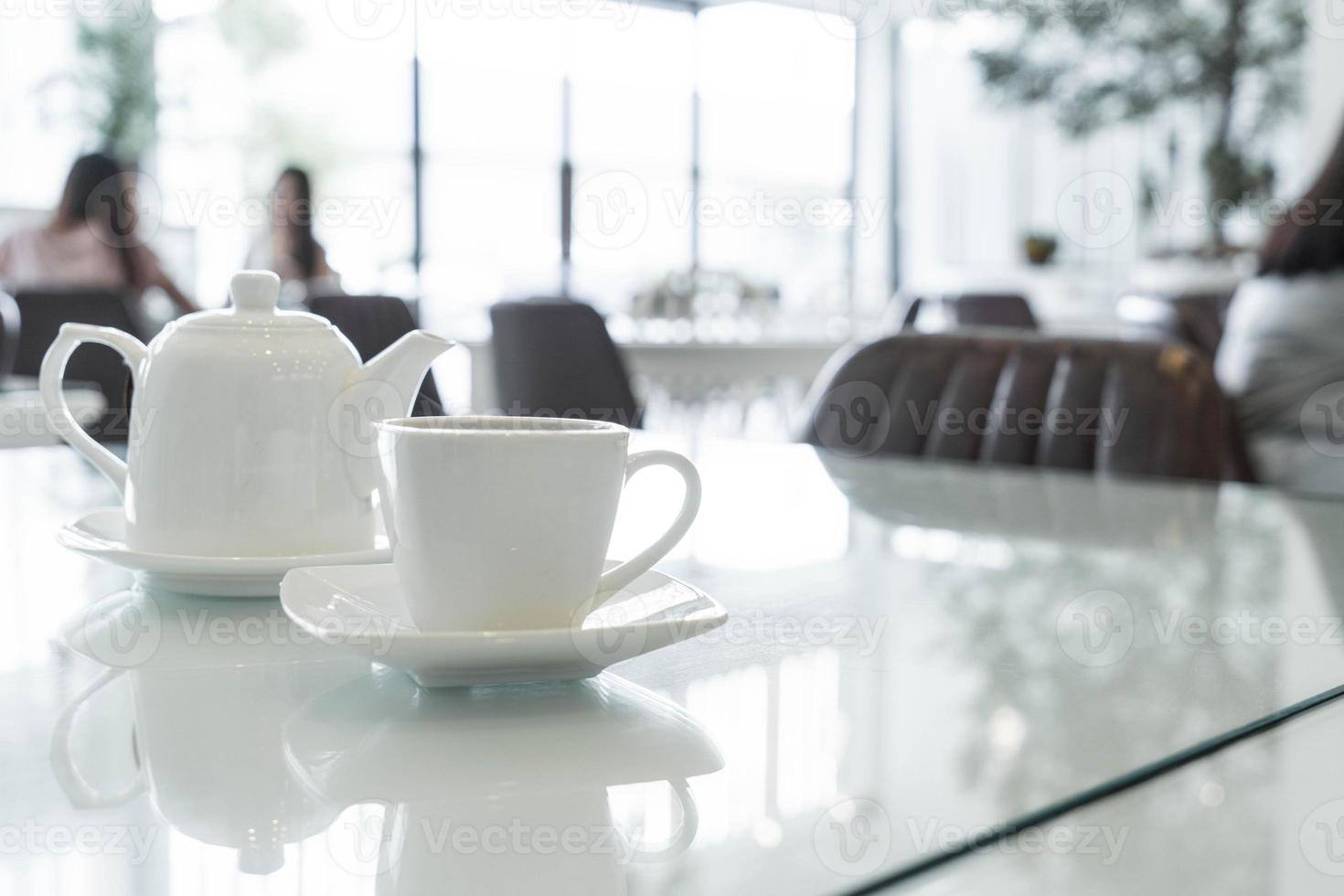 Hot tea cup on the table photo