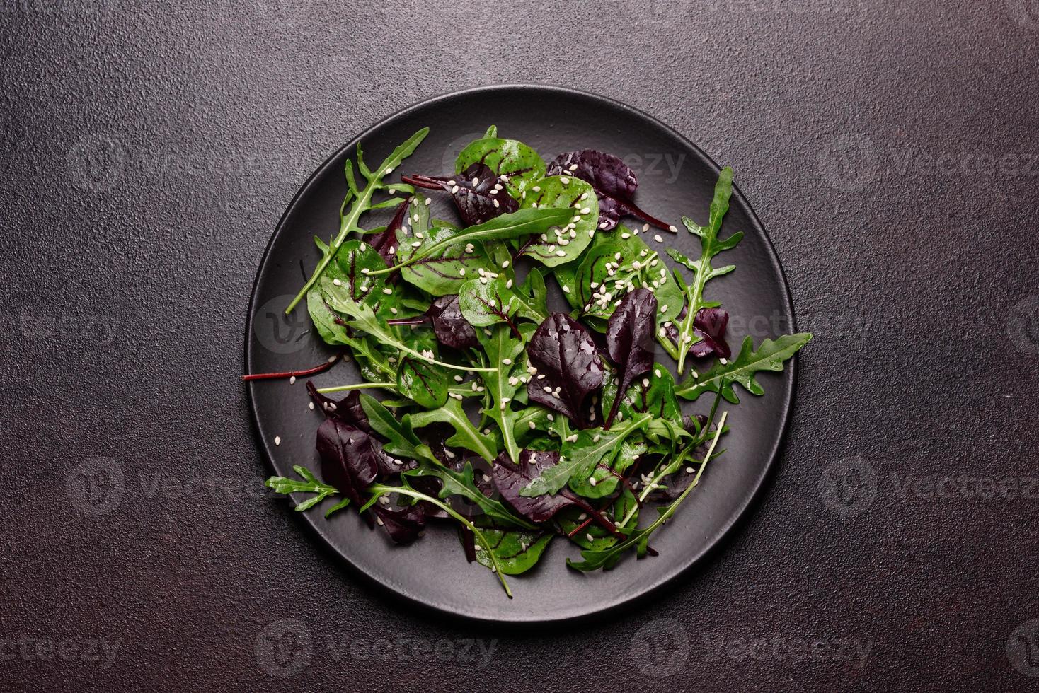 Healthy food, salad mix with arugula, spinach, bulls blood photo